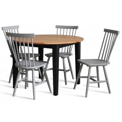 Dalsland-Essgruppe: Runder Tisch in Eiche / Schwarz mit 4 grauen Rohrgeflechtsthlen