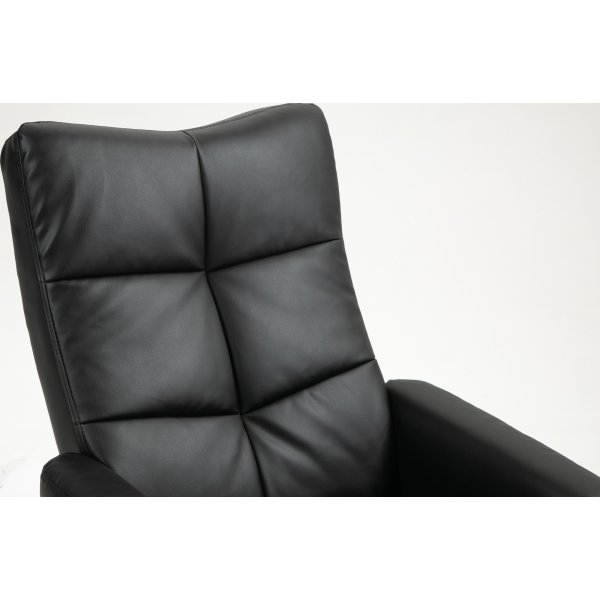 Duva Liegesessel mit Fuhocker aus schwarzem PU mit braunen Beinen